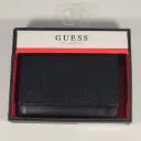 BILLETERA GUESS CUERO NEGRO 31GO110039